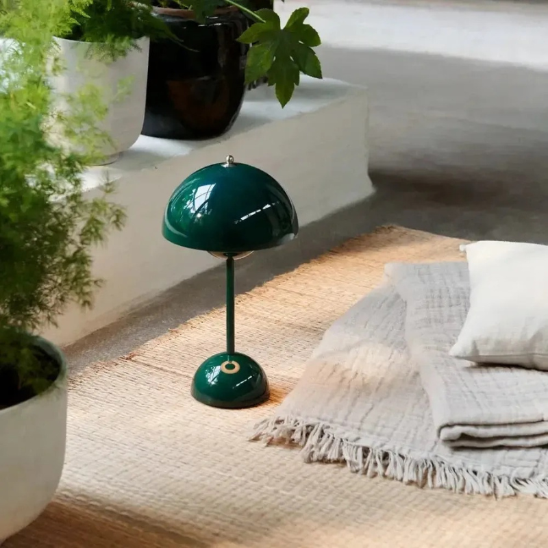 Minimalist rechargeable table lamp with dimmable LED light and cordless design