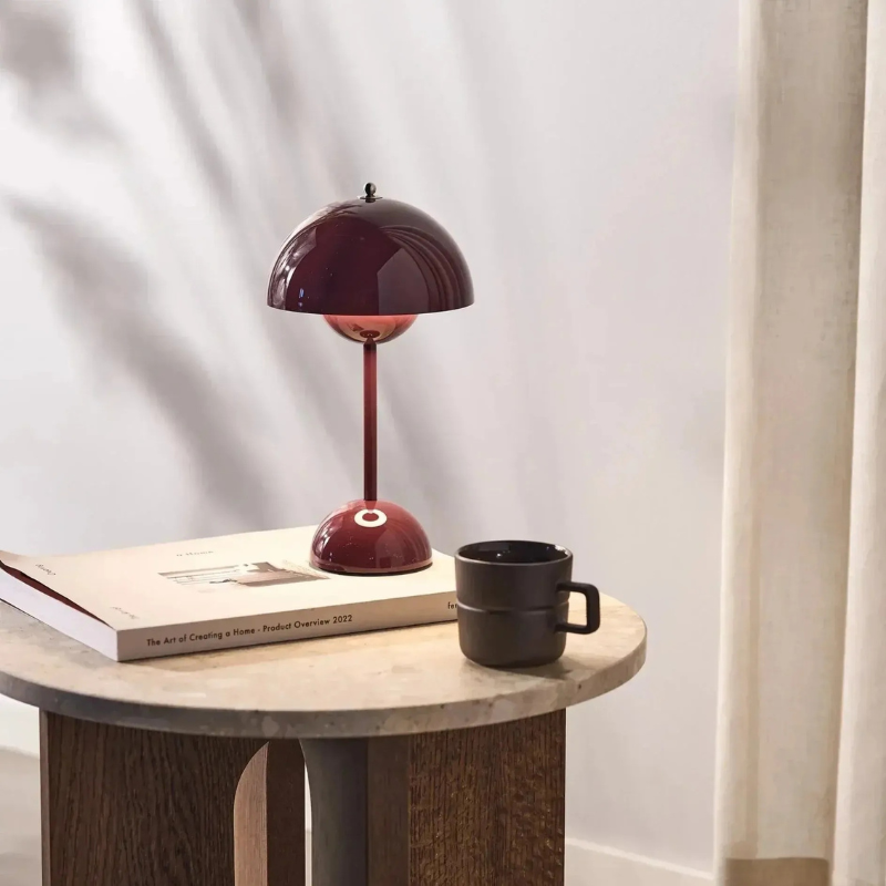 Minimalist rechargeable table lamp with dimmable LED light and cordless design