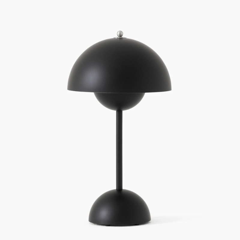 Minimalist rechargeable table lamp with dimmable LED light and cordless design