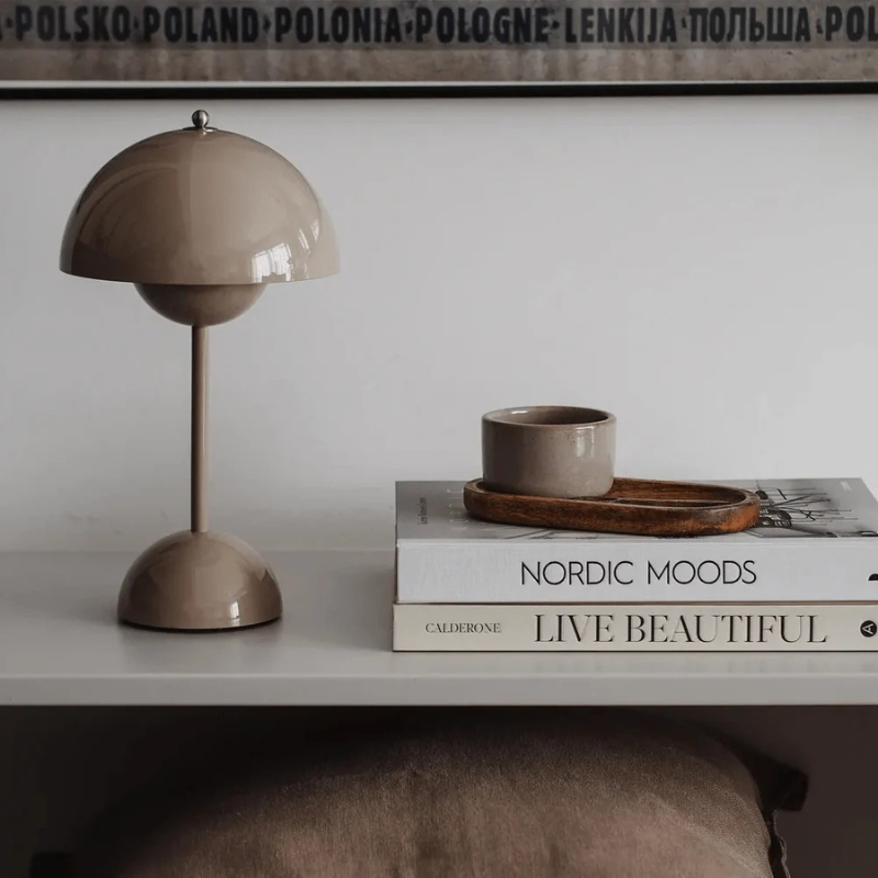 Minimalist rechargeable table lamp with dimmable LED light and cordless design