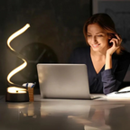Modern spiral LED table lamp with dimmable light and touch control in a sleek twisted design