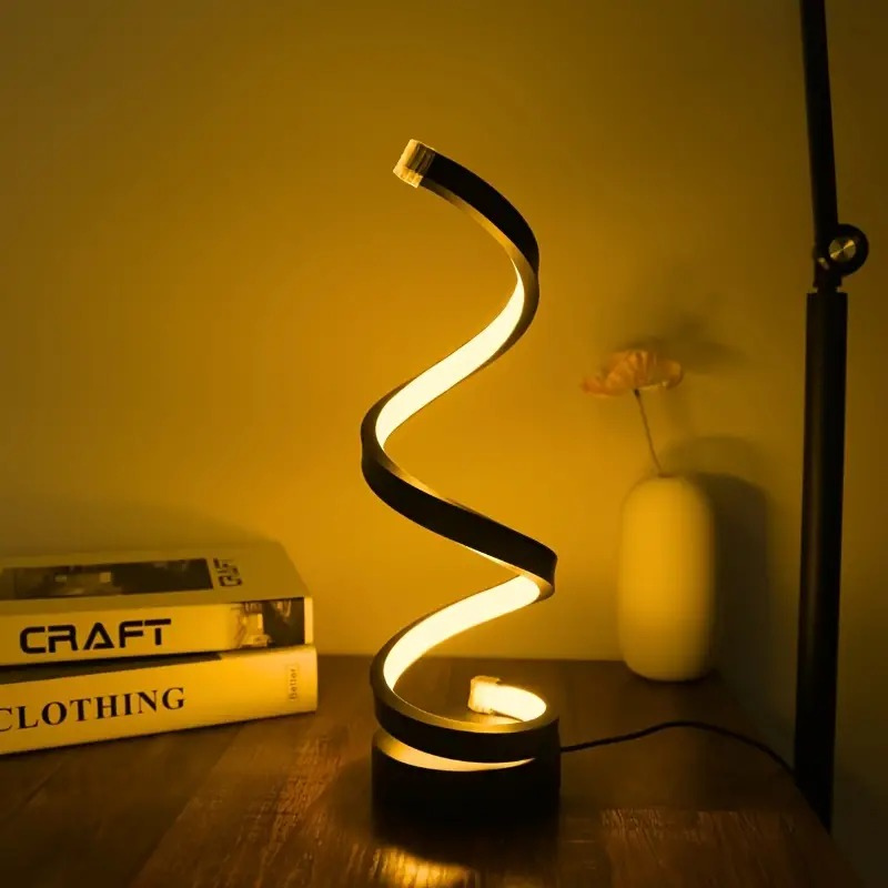 Modern spiral LED table lamp with dimmable light and touch control in a sleek twisted design