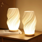 Compact sculptural LED swirl lamp with warm dimmable glow and USB power
