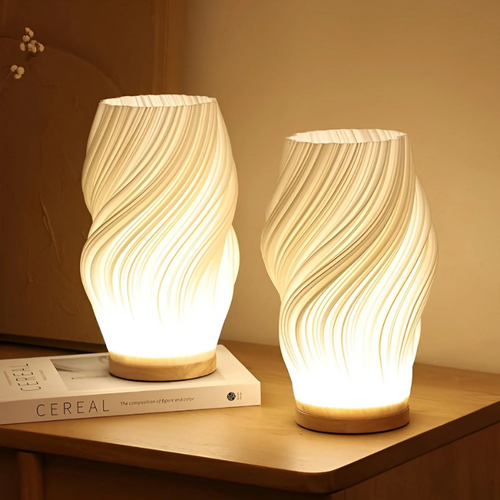 Compact sculptural LED swirl lamp with warm dimmable glow and USB power
