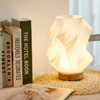 Compact sculptural LED swirl lamp with warm dimmable glow and USB power