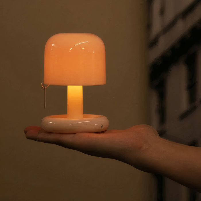 Compact USB rechargeable table lamp with warm sunset light