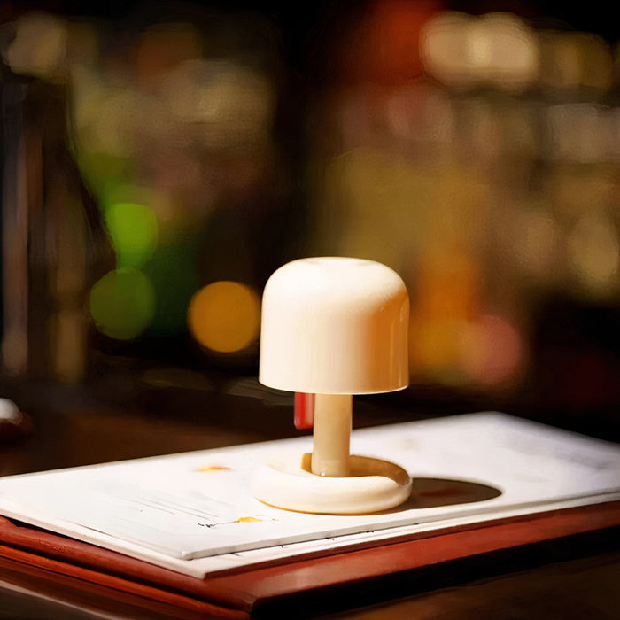 Compact USB rechargeable table lamp with warm sunset light
