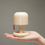 Compact USB rechargeable table lamp with warm sunset light