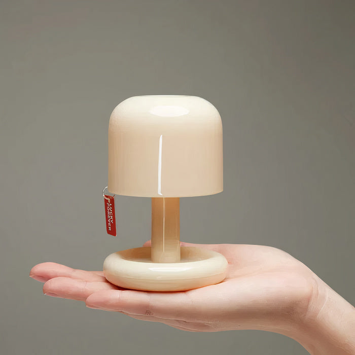 Compact USB rechargeable table lamp with warm sunset light