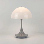 Wireless rechargeable LED table lamp with soft ambient glow and modern alloy-acrylic design