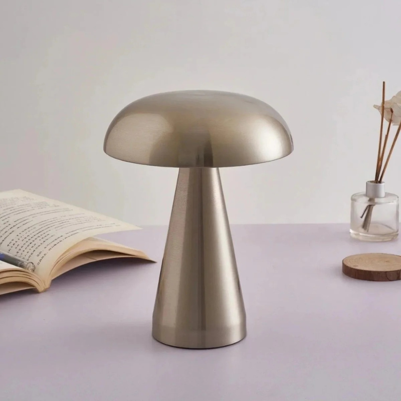 Compact wireless mini LED table lamp with touch control and minimalist Danish design