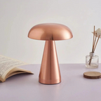 Compact wireless mini LED table lamp with touch control and minimalist Danish design