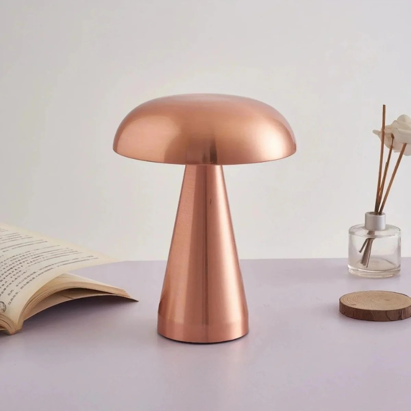 Compact wireless mini LED table lamp with touch control and minimalist Danish design